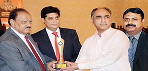 Receiving Award from President Mr. Mamnoon Husain